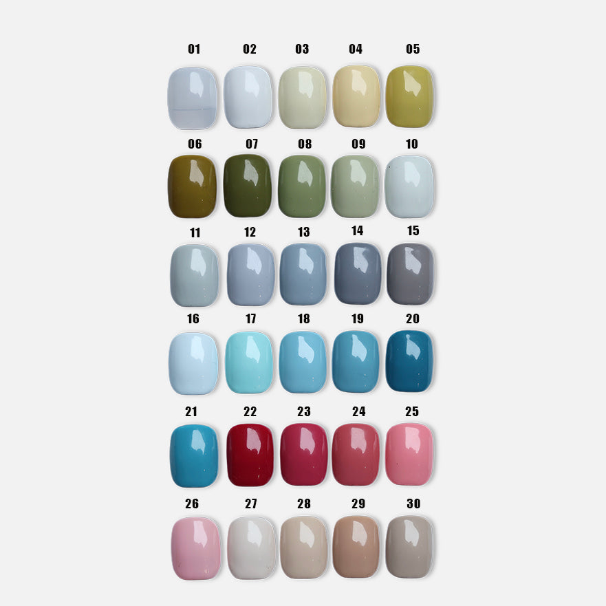 Classic Solid • 60 Colors Available press-on nails shown in a close-up grid of glossy solid-color swatches.