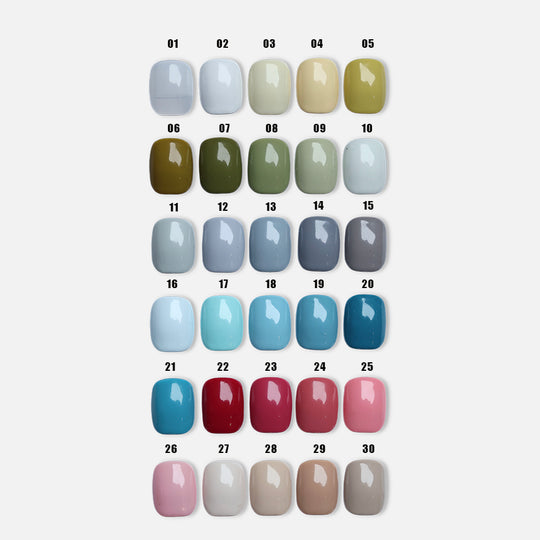 Classic Solid • 60 Colors Available press-on nails shown in a close-up grid of glossy solid-color swatches.
