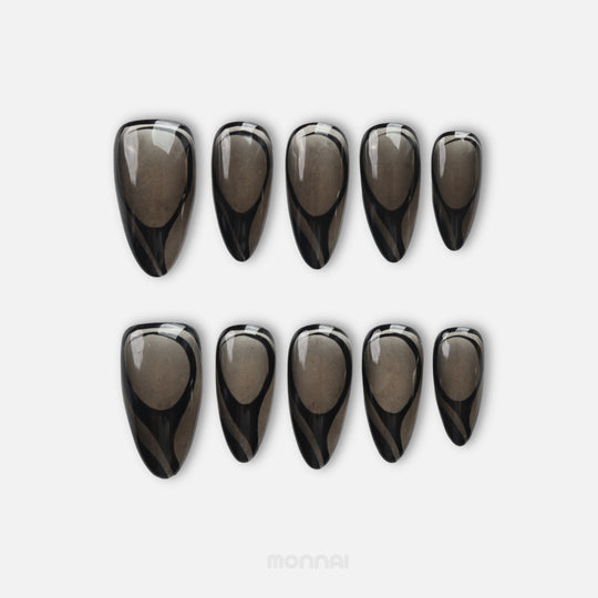 Dark Current press on nails with sheer smoky gray base and glossy black abstract curves