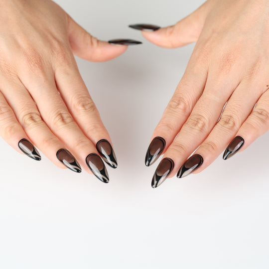 Dark Current press on nails with sheer smoky gray and glossy black curves, modern minimalist translucent design