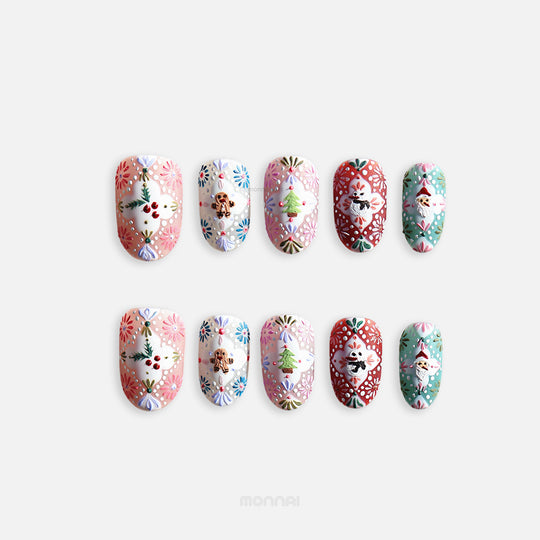 Ginger Cookie Christmas-themed press-on nails shown laid out, with embossed folk art patterns and 3D gingerbread, tree, snowman, Santa motifs.