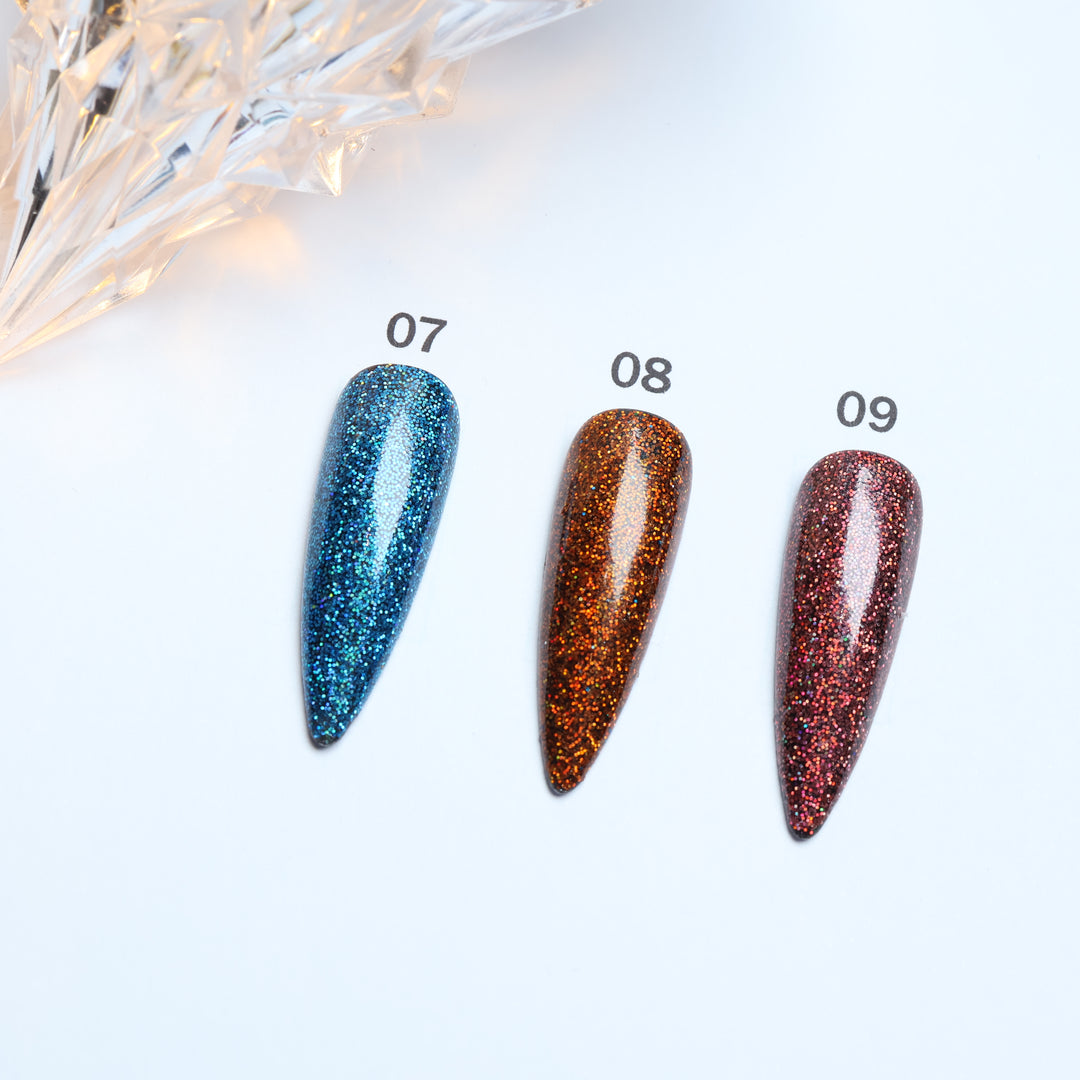 Glitter • 12 Colors Available press-on nails in blue, orange, and pink laid out in close-up