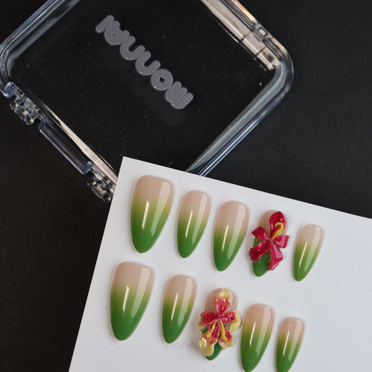 Green Sprout press-on nails shown laid out, with nude bases, green ombré tips, and 3D orchid details.
