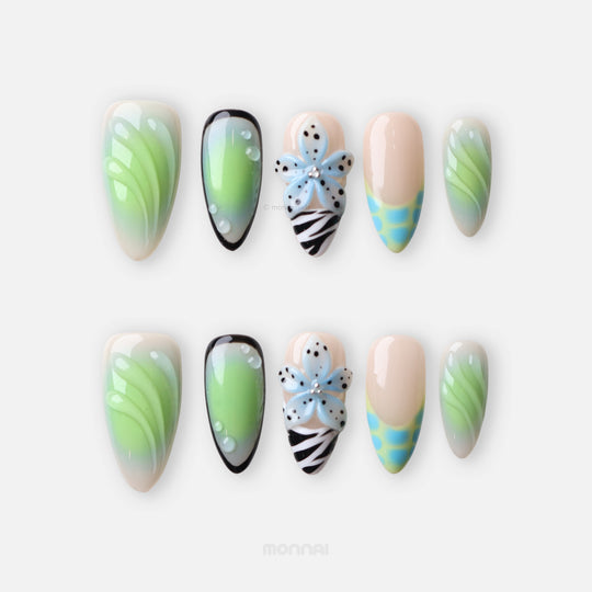 Lime Petals press-on nails set with mint green aura, zebra print, 3D floral accent and blue spotted tips