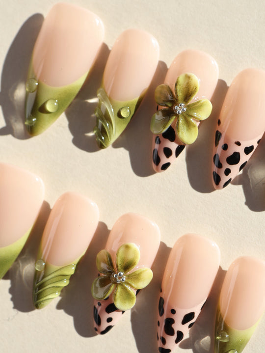 Nature Hunt press-on nails with nude, olive French tips, leopard print and 3D floral accents