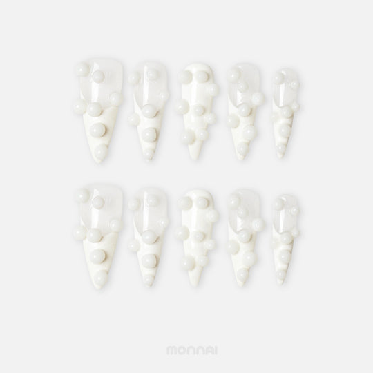 Pearl Bubbles press-on nails with white 3D bubble accents, laid out in a clean close-up.
