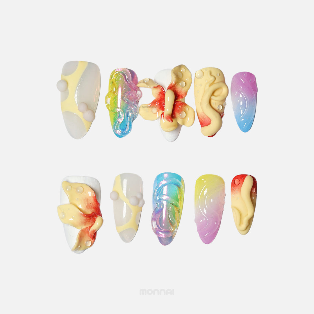 Playful Bloom press-on nails laid out with bold 3D botanical sculptures, aurora gradients, and frosted white textures