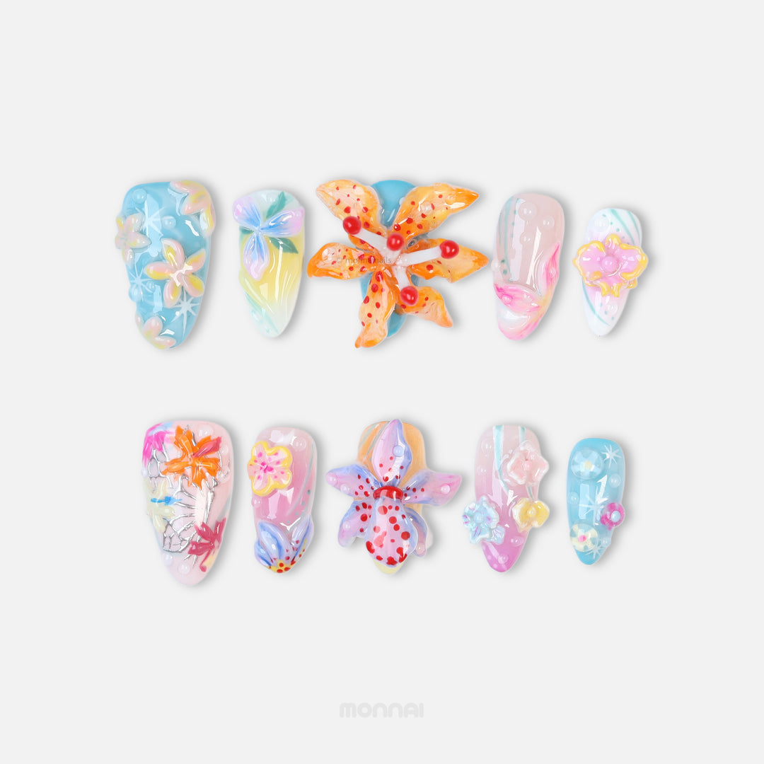 Radiant Bloom press-on nails in close-up, with soft pastel 3D flowers, glossy translucent layers, and dreamy candy-like details.