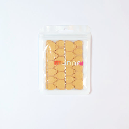 Regular Adhesive Tabs (10 Sheets/Box) press-on nails adhesive tabs in clear pouch, laid out in tan sheets