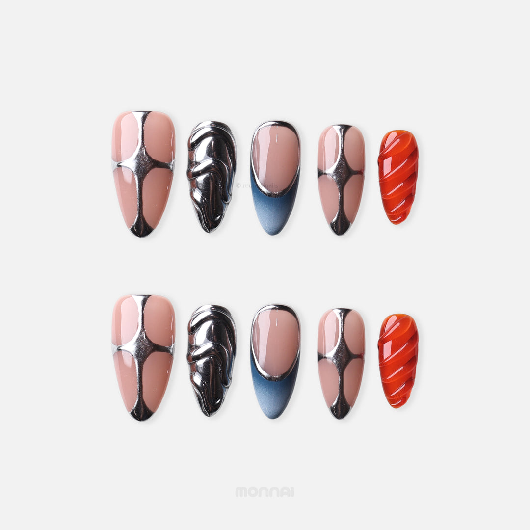 Sculpted Flame press-on nails laid out in nude, chrome, blue gradient and red ribbed designs