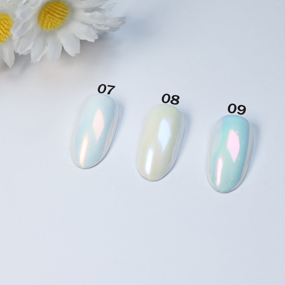 Soft Misty Glow • 9 Colors Available press-on nails in soft blue, ivory and aqua shades, shown in close-up as samples 07-09.