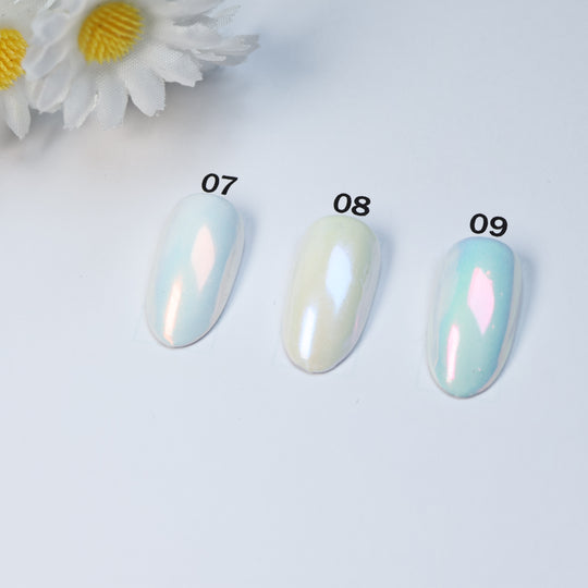 Soft Misty Glow • 9 Colors Available press-on nails in soft blue, ivory and aqua shades, shown in close-up as samples 07-09.