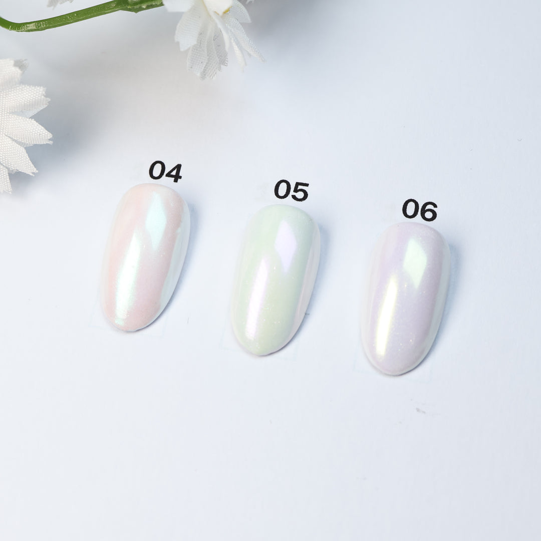 Soft Misty Glow • 9 Colors Available press-on nails in pastel pink, mint, and lilac iridescent shades, laid out in close-up.