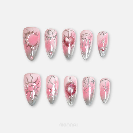 Virgo press on nails from the Zodiac Collection, featuring blush pink and silver tones, pearl accents, constellation details and celestial motifs.