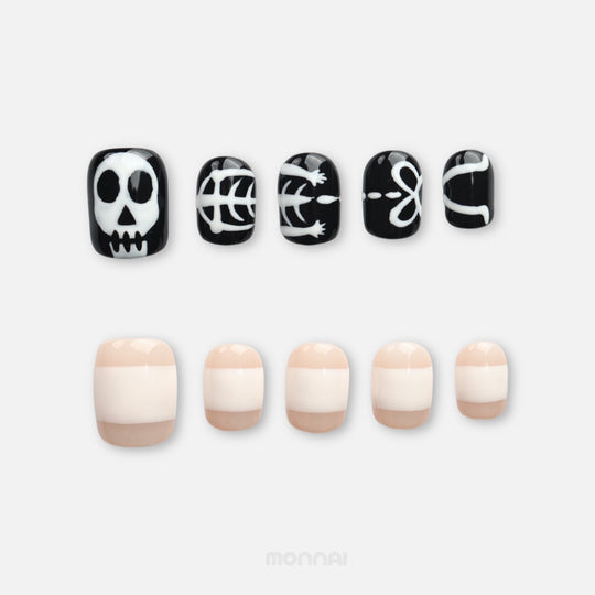 Bone Party press on nails with black-and-white skeleton art and nude bandage-inspired stripes