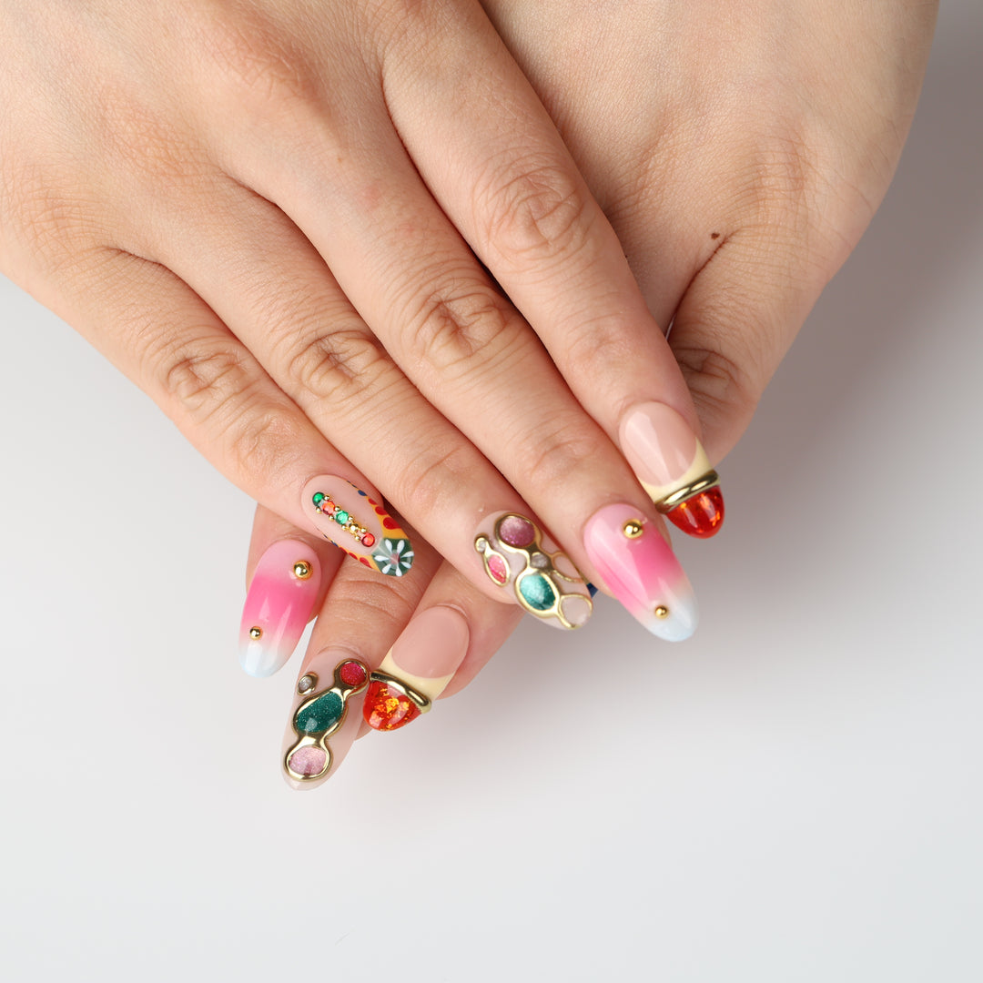 Jewel Carnival boho press on nails with colorful jewels, gold accents, and retro floral motifs