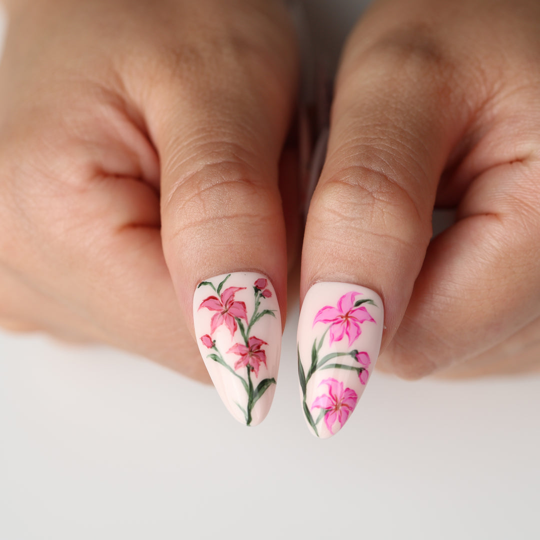Porcelain Garden press on nails with pink floral lilies, green stems and soft blush porcelain-inspired design